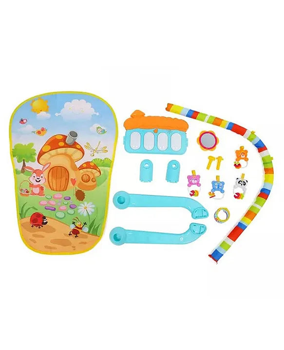 Complete parts layout of the baby piano gym play mat showing mat, piano, arches, and colorful hanging toys before assembly