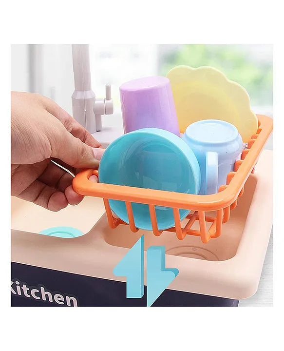 Close up of kids kitchen sink playset showing dish rack with cups plates and utensils being lifted