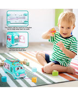 Child playing with Musical Shape Sorting Bus with pull rope and colorful blocks for matching play