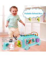 Toddler pulling the Musical Shape Sorting Bus with matching blocks and xylophone music play features